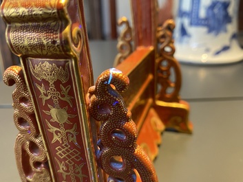 A Chinese famille rose table screen with a winter landscape and a scene with Europeans, various seals, Qianlong mark, 18/19th C.