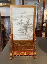 A Chinese famille rose table screen with a winter landscape and a scene with Europeans, various seals, Qianlong mark, 18/19th C.