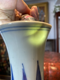 A Chinese blue and white bottle vase with a frog, a lizard and butterflies, Transitional period