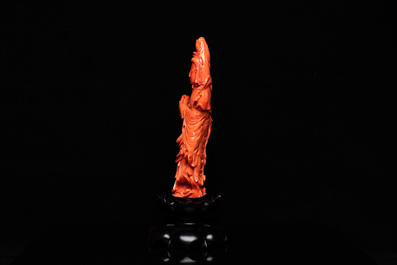 A Chinese carved red coral 'Tara' figure, 19/20th C.