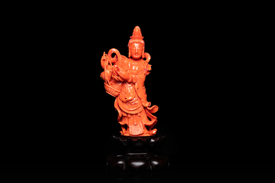A Chinese carved red coral 'Tara' figure, 19/20th C.