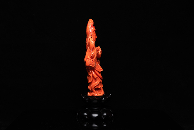 A Chinese carved red coral 'Tara' figure, 19/20th C.