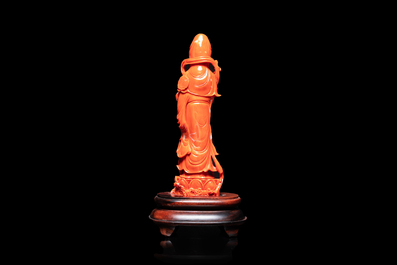 A Chinese carved red coral 'Guanyin' figure, 19/20th C.