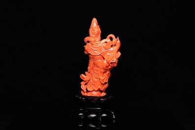 A Chinese carved red coral 'Tara' figure, 19/20th C.