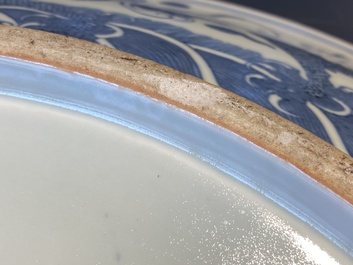A massive Chinese blue and white 'dragon' dish, Kangxi mark, 19th C.