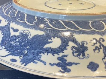 A massive Chinese blue and white 'dragon' dish, Kangxi mark, 19th C.