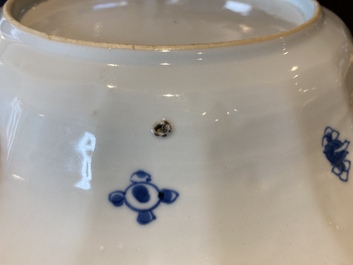 A pair of Chinese lobed blue and white 'fish' dishes, Kangxi