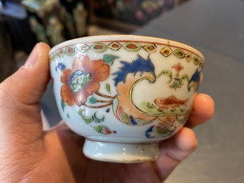 A Chinese famille rose 'Pompadour' cup and saucer, Yongzheng/Qianlong