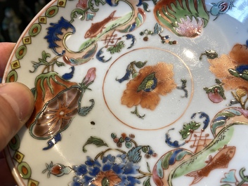 A Chinese famille rose 'Pompadour' cup and saucer, Yongzheng/Qianlong