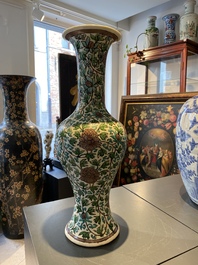 A Chinese verte biscuit 'peony scroll' vase, Ming