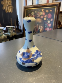 A Chinese blue, white and copper-red 'dragon' vase, Kangxi
