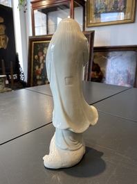 A Chinese Dehua blanc de Chine figure of Liu Hai with the toad, Kangxi