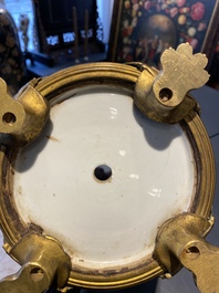 Een Chinese celadon 'lotusslingers' vaas met blauw-witte en koperrode panelen, Kangxi