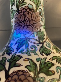 A Chinese verte biscuit 'peony scroll' vase, Ming