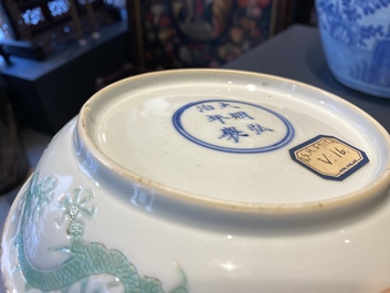 A Chinese incised and green-glazed 'dragon' dish, Hongzhi mark, Ming