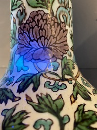 A Chinese verte biscuit 'peony scroll' vase, Ming