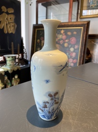 A Chinese blue, white and copper-red 'magpie and prunus' vase, Kangxi mark, 19/20th C.