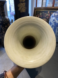 A Chinese verte biscuit 'peony scroll' vase, Ming