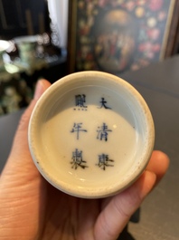 A Chinese blue, white and copper-red 'magpie and prunus' vase, Kangxi mark, 19/20th C.