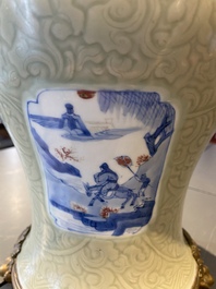 Een Chinese celadon 'lotusslingers' vaas met blauw-witte en koperrode panelen, Kangxi