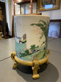 A Chinese famille verte brush pot on gilt bronze stand, Kangxi