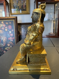 Een Chinese vergulde bronzen figuur van Guandi, Ming