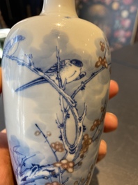A Chinese blue, white and copper-red 'magpie and prunus' vase, Kangxi mark, 19/20th C.