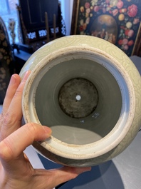 Een Chinese celadon 'lotusslingers' vaas met blauw-witte en koperrode panelen, Kangxi