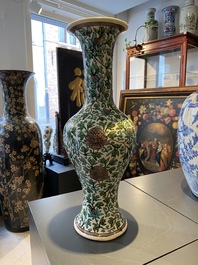 A Chinese verte biscuit 'peony scroll' vase, Ming