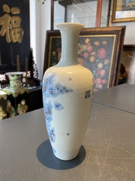 A Chinese blue, white and copper-red 'magpie and prunus' vase, Kangxi mark, 19/20th C.