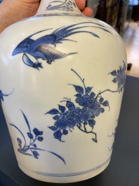 A Chinese blue and white 'Hatcher cargo' bottle vase, Transitional period