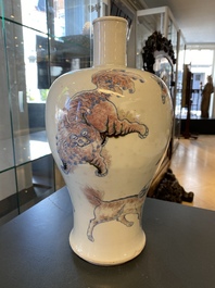 A Chinese blue, white and copper-red 'meiping' vase with mythical animals, Qianlong mark, 18/19th C.