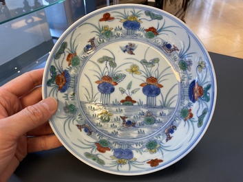A Chinese doucai 'mandarin ducks' plate, Chenghua mark, 18/19th C.