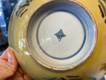 A Chinese yellow-ground 'brinjal' biscuit bowl, Kangxi