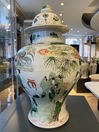 A Chinese famille verte 'Xi Xiang Ji' vase and cover, Kangxi
