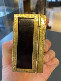 A Chinese gilt-copper box set with glass plaques, Beijing Imperial workshops, Qianlong