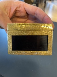 A Chinese gilt-copper box set with glass plaques, Beijing Imperial workshops, Qianlong