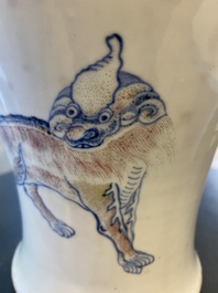 A Chinese blue, white and copper-red 'meiping' vase with mythical animals, Qianlong mark, 18/19th C.