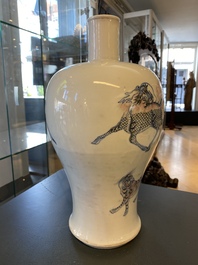 A Chinese blue, white and copper-red 'meiping' vase with mythical animals, Qianlong mark, 18/19th C.