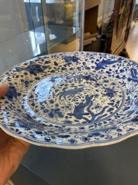 A Chinese blue and white lobed 'crab and fish' dish, Yu mark, Kangxi