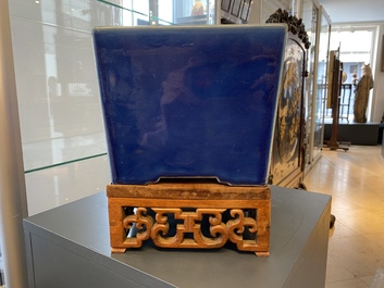 A Chinese rectangular blue-glazed jardini&egrave;re on wooden stand, 19th C.