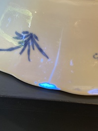 A Chinese blue and white lobed 'crab and fish' dish, Yu mark, Kangxi