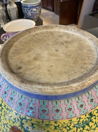 A large Chinese famille rose yellow-ground fish bowl with fine floral scrolls, 19th C.