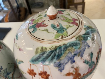 Twee Chinese famille rose dekselpotten met 'lentefestival' decor, 19e eeuw