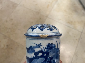 A Dutch Delft blue and white tripod caster with birds near blossoms, 1st half 18th C.