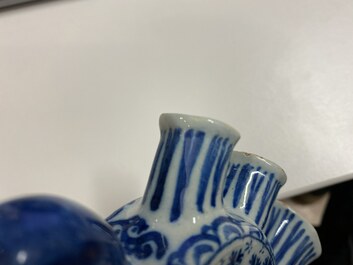 A Dutch Delft blue and white heart-shaped tulip vase with putti, 1st half 18th C.