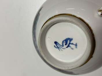 A The Hague-decorated Ansbach porcelain 'leopard and otter' cup and saucer, 18th C.