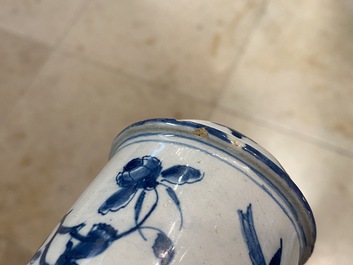 A Dutch Delft blue and white tripod caster with birds near blossoms, 1st half 18th C.