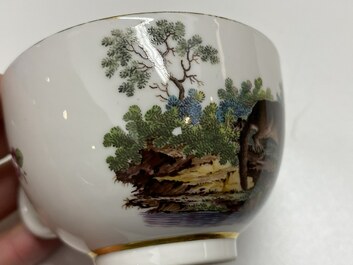 A The Hague-decorated Ansbach porcelain 'leopard and otter' cup and saucer, 18th C.