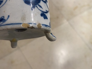 A Dutch Delft blue and white tripod caster with birds near blossoms, 1st half 18th C.